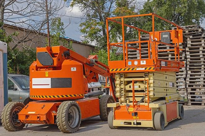 forklift moving crates in a large warehouse in Aventura